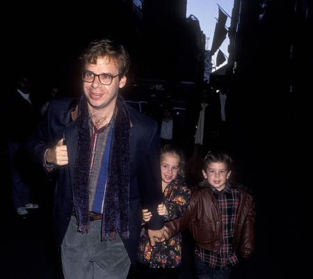 Childhood photo of Mitchell Moranis with his father and sister